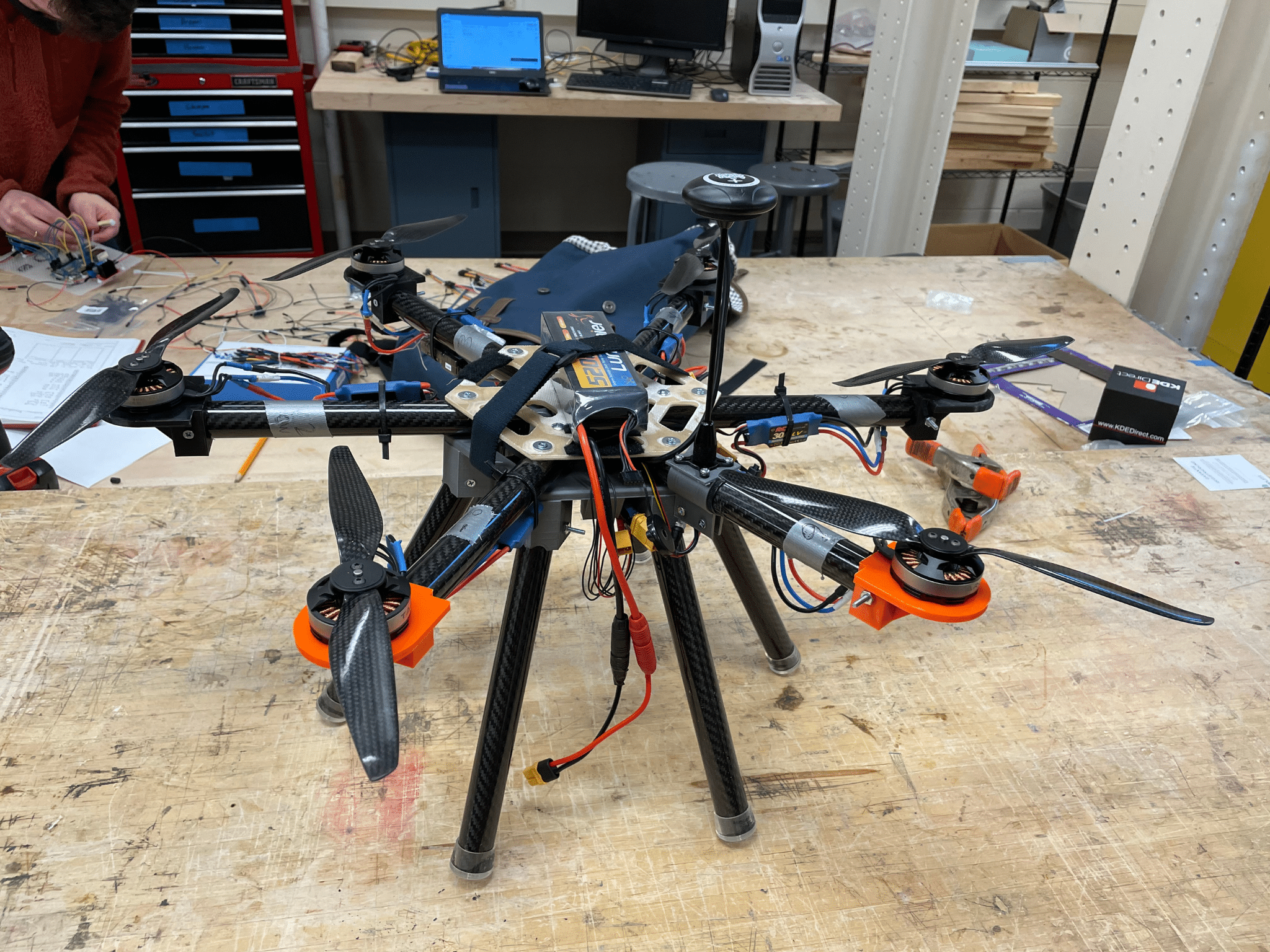 Black colored drone on work table